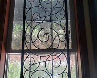 Two Same Size Wrought Iron Window Decor