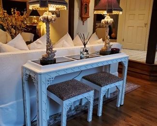 White console table with matching footstools - table is 32" tall x 56" wide x 14" deep. Each stool is 17" tall x 18" wide x 14" deep.