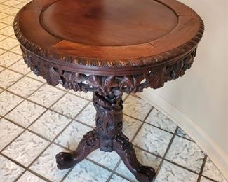 Wood carved side table - 31" tall x 24" diameter