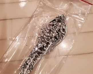 Handle of sterling silver piece