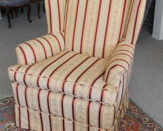 16. $125.00. Upholstered wing back chair with stripes 39.5” X 30” X 31”