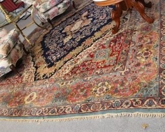 21. $1,200.00. Handmade rug 132” X 105”