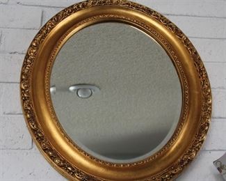 35. $125.00. Gold Mirror wood framed beveled glass 25” X 21”