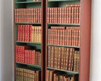 38. $600.00. Asian Lacquered Display/Bookcases. Meander/Greek key design with carved fretwork top. On the front legs are carved and applied figures. 84” X 18” X 10
Note: Books are pictured and priced further down.