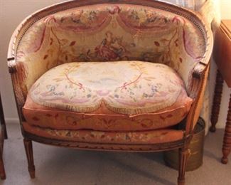 46. $400.00. Gondola style arms petite point settee some loss to the piping and pulled areas of the sold note the "as is" condition. See additional pictures for close up. 38.5” X 25” X 21”