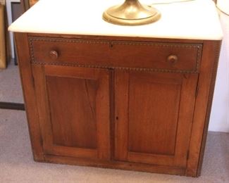 55. $200.00. Marble top washstand/ cabinet 27” X 31” x 16” circa 1860.