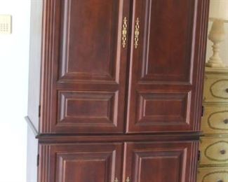 63. $100.00. TV cabinet armoire
28.5” X 40” X 23”