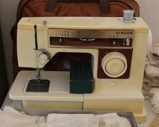 66. $100.00. Singer sewing machine model 6105