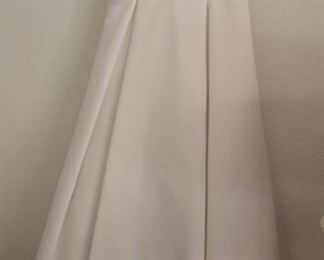 70. $50.00. White dress approx. size 8 nothing tagged. Lovely.