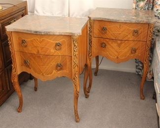 71. $300.00. French style side tables. Inlay satinwood floral cartouche fronts and marble tops. 26.5” X 20” X 14”