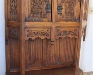 2. $900.00. European Hunters cabinet heavily carved 57.5” X 54” X 18.5”