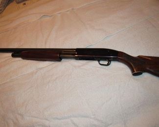 12 GA Mossberg with leather case -- No discounts on guns