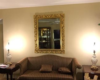 Love seat, gold framed mirror 
