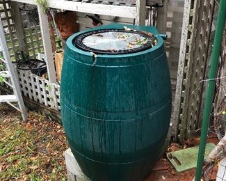 One of several rain collection barrels