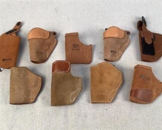 Mfg - (9) Assorted Lot of
Model - Leather Holsters
Located in Chattanooga, TN
Condition - 3 - Light Wear
This is an assorted lot of 8 inside the waistband (and 1 pocket) leather holsters. These holsters are for small frame handguns and revolvers.