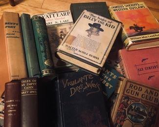 1st Edition Tombstone + 1st Ed. and antique Western books.