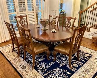 Bernhardt dining table and 8 leather upholstered chairs