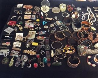 a tableful of costume jewelry 