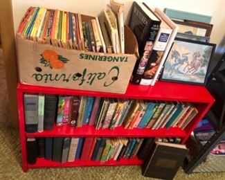 vintage books and framed art