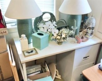 lamps, decor, frames, photo albums, desk with filing cabinet, candles