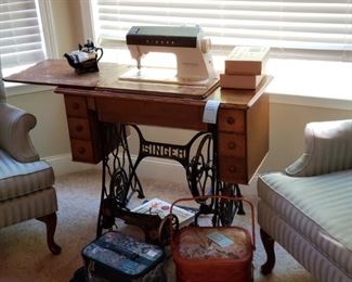 Vintage Singer Sewing Machine Cabinet, altered to accommodate more modern machines. Please Note: Both the original Singer sewing machine and the one shown are available for separate purchase.