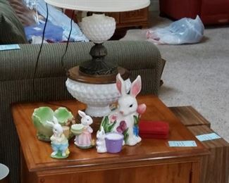 Bevvy of Bunnies near a Large Lamp