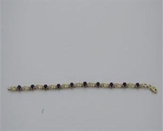 Lot 123
10K Gold bracelet with Diamonds and Sapphires