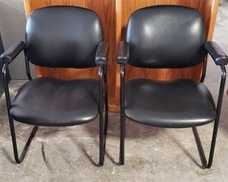 Pair of Black Vinyl Office Chairs w/Padded Arms ~ 24 x 24 x 33 in. tall ~ Seat: 18 in. ~ some minor dings ~ see pix