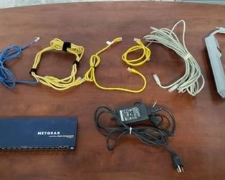 Netgear Gigabit Ethereal Switch ~ Model GS116, Power Strip, and Cat 5 Cables