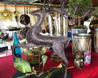 $45. XL metal reindeer candelabra. tea lights can be placed across tops of his antlers. add some holiday cheer to your patio or screen porch with this guy!