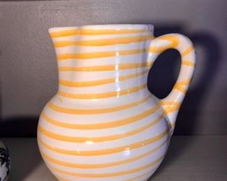 $15. Medium sized yellow pitcher
