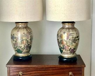 $695 PAIR. Vintage Frederick Cooper Chinoiserie Lamps Pair 

Stunning porcelain vase lamps by Frederick Cooper of Chicago. Lovely pastel/gold design of birds and flowers set against a cream background.  Topped with a wood cap and brass Asian finial. Wood base with a bright brass decorative trim ring. Original Frederick Cooper tags.  Lamps newly refurbished.  Approx. 20.5” to top of socket, 29” to top of finial, urn at widest point 8.5” wide.  
