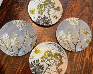 $20.  Set of 4 artsy painted plates. Great for wall hanging. 