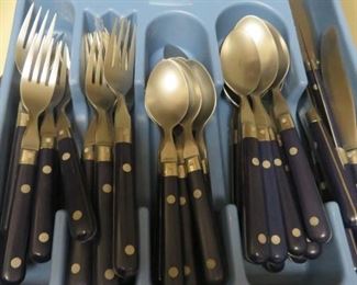 $26.00, blue handle W.F. Mardi Grass service for 8 missing one knife