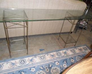 Glass and metal credenza or use them as two stands with glass shelves 