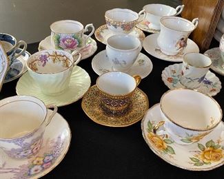 Assorted cups and saucers, most are English