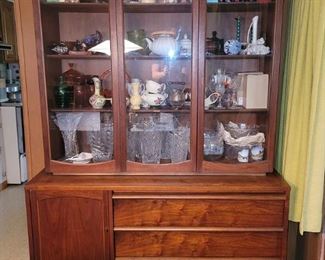 MCM Lane china cabinet (two pieces) $550. 76"h x  50"w x 18"d.  There is a buffet cabinet and table with eight chairs to match