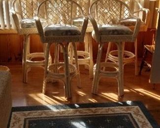 Rattan bar stools with upholstered seats