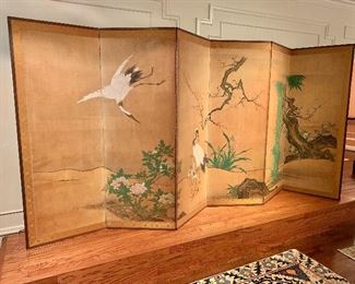 $1800; Late 17th century six panel screen; ink on paper depicting cranes, bamboo, plum blossoms, lilies and peonies; Kano school; 67.75" H, each panel is approximately 24.5" wide. (as is) Platform not included.