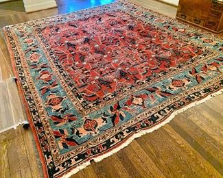 $1150; Hand knotted wool rug, made in Pakistan, 9'5" x 8'1",  (may have a repair at one fringe edge)