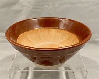$40; Studio art Rust Glazed Bowl, 2.5" H x 6" W