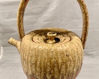 $75; Studio pottery ceramic handled teapot; 10" H x 8.5" W