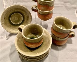 $50; Lot of Five Ceramic Cups and Saucers with Green Glaze; 6" saucers, cups are 2.5" H 
