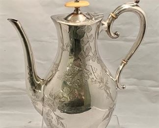 $75; Silver Plate Coffee Pot with Hand Etched Design; 9.5" H, 9.5" from handle to spout