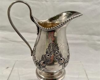 $30; Silver Plated Creamer;  Repousse Design, 5" H, 4" from handle to spout