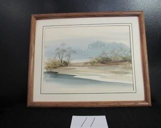 Framed seaside painting