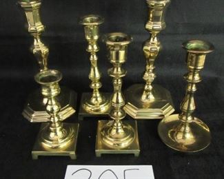 Lot of solid brass candlesticks