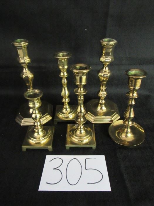 Lot of solid brass candlesticks