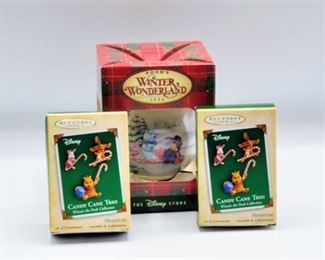 Disney Ornaments (2) Hallmark Keepsakes 2004 Winnie The Pooh Candy Cane Trio and Pooh's Winter Wonderland 1996 from The Disney Store  All in Original Boxes