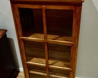 Glass Front Cabinet with Shelves. 